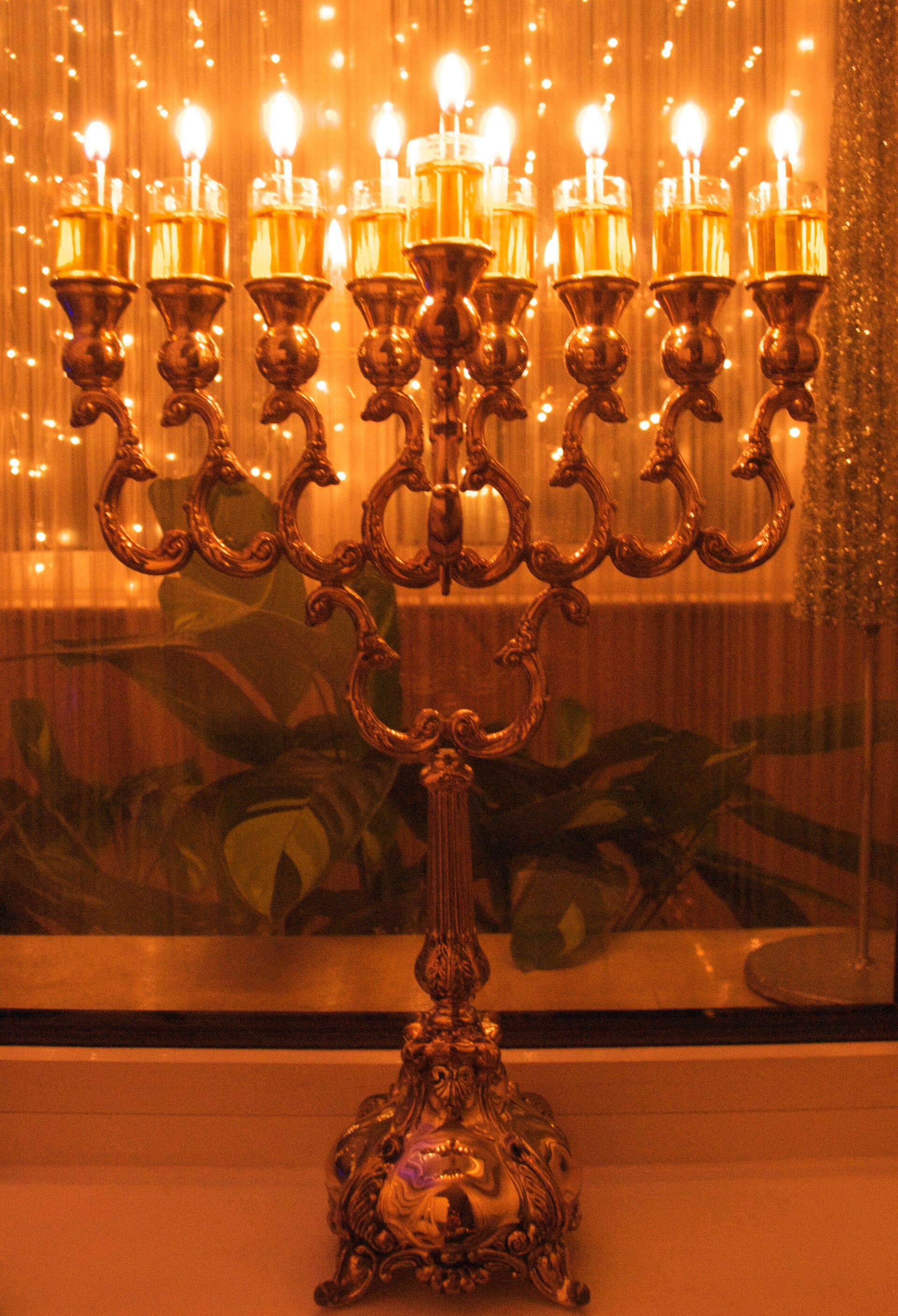 A sterling-silver Hanukkah menorah (eight-branched candelabrum) lit for the holiday