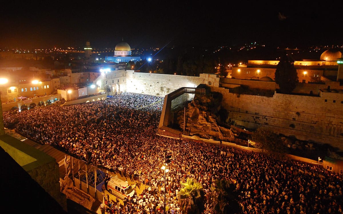 Thousands gather for late-night Selichot prayers at the Western Wall in Jerusalem, illuminated ahead of the High Holidays
