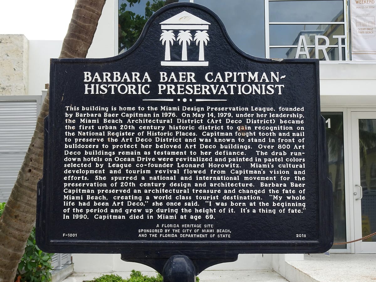 The historical marker outside 1001 Ocean Drive commemorating Barbara Baer Capitman and the founding of the Miami Design Preservation League